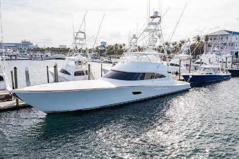 Sportfishing boats docked at a South Florida marina, representing marine air conditioning and cooling-system service for onboard cabins.